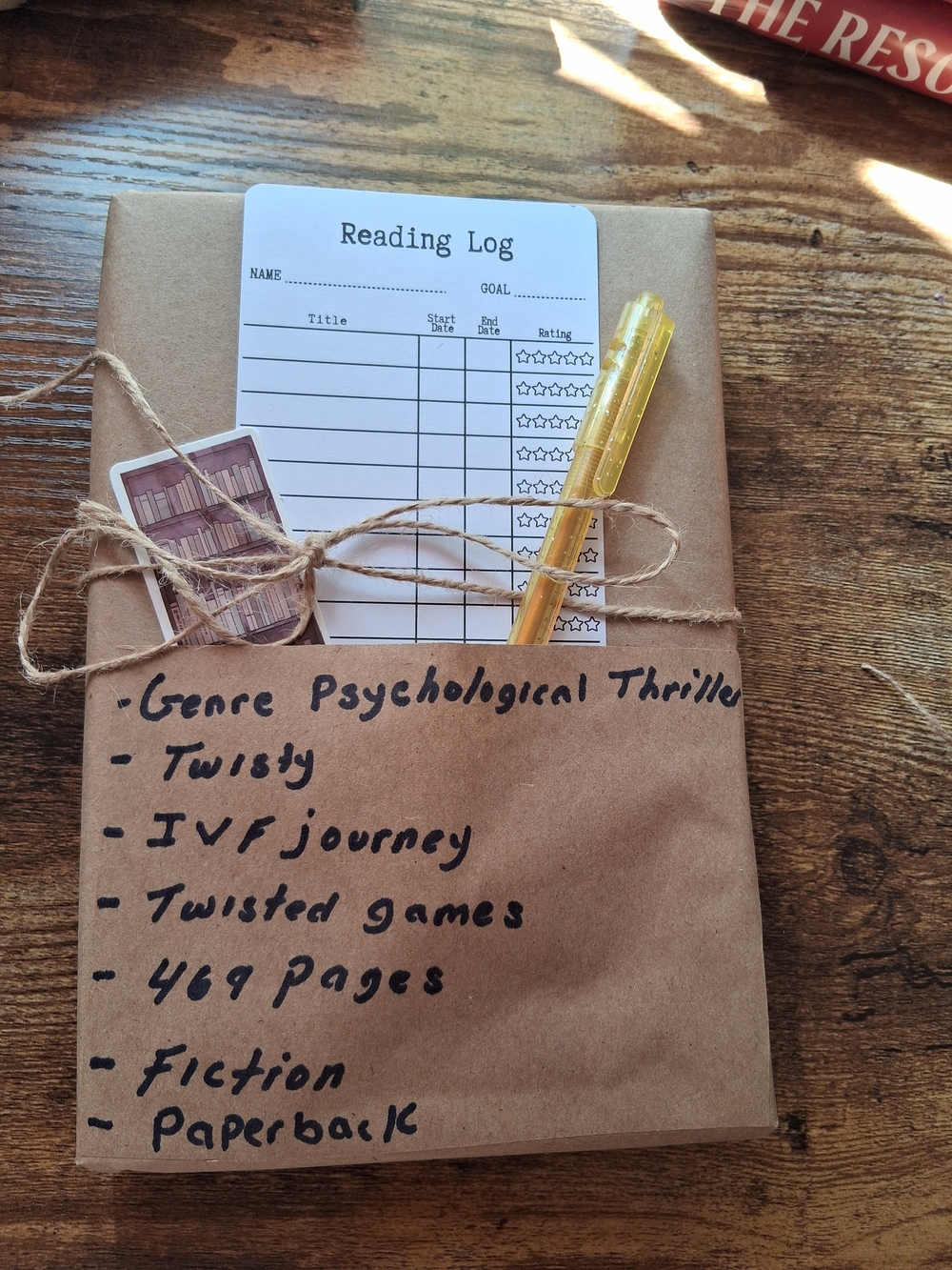 Blind Date With A Book Wrapped Paperback Book with Yellow Pen & Reading Log